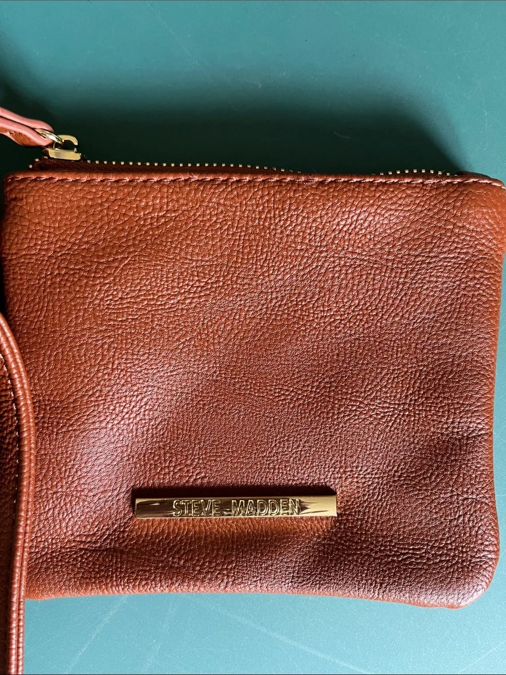 Steve Madden dark green backpack purse with change purse.